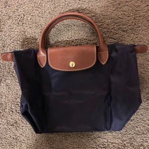 Longchamp purple tote.
